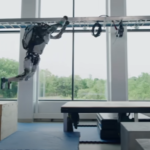 Atlas robot does broad jump.